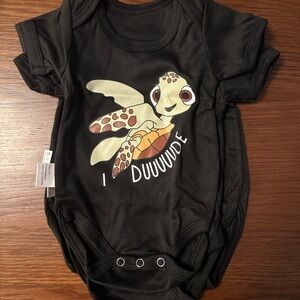 Black Baby Bodysuit with Turtle Graphic